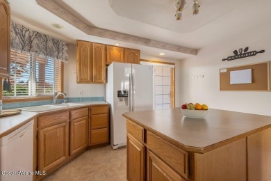 BRAND NEW FURNACE AND AC! Spacious single level home with 20' x on Hayden Lake Country Club in Idaho - for sale on GolfHomes.com, golf home, golf lot