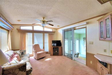 Welcome to West View Ridge Unit H54 in Haines City. This 55+ on Southern Dunes Golf and Country Club in Florida - for sale on GolfHomes.com, golf home, golf lot