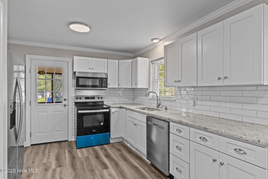 Take note of this nicely renovated 3 bedroom, 2 bath home in on The Lakes Country Club in North Carolina - for sale on GolfHomes.com, golf home, golf lot