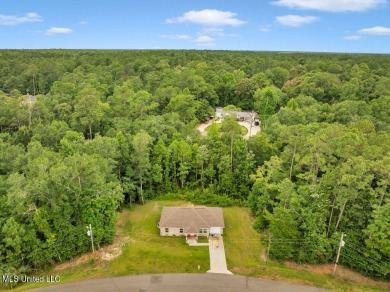 This 3 bed, 2 bath home built in 2023 is just a baby which means on Diamondhead Country Club in Mississippi - for sale on GolfHomes.com, golf home, golf lot