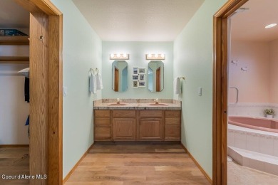 BRAND NEW FURNACE AND AC! Spacious single level home with 20' x on Hayden Lake Country Club in Idaho - for sale on GolfHomes.com, golf home, golf lot