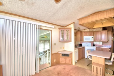 Welcome to West View Ridge Unit H54 in Haines City. This 55+ on Southern Dunes Golf and Country Club in Florida - for sale on GolfHomes.com, golf home, golf lot