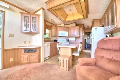 Welcome to West View Ridge Unit H54 in Haines City. This 55+ on Southern Dunes Golf and Country Club in Florida - for sale on GolfHomes.com, golf home, golf lot