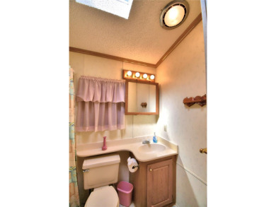 Welcome to West View Ridge Unit H54 in Haines City. This 55+ on Southern Dunes Golf and Country Club in Florida - for sale on GolfHomes.com, golf home, golf lot