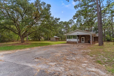 Take note of this nicely renovated 3 bedroom, 2 bath home in on The Lakes Country Club in North Carolina - for sale on GolfHomes.com, golf home, golf lot