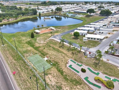 Welcome to West View Ridge Unit H54 in Haines City. This 55+ on Southern Dunes Golf and Country Club in Florida - for sale on GolfHomes.com, golf home, golf lot