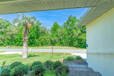 Back on the market due to buyer financing falling through -- and on Twisted Oaks Golf Club in Florida - for sale on GolfHomes.com, golf home, golf lot