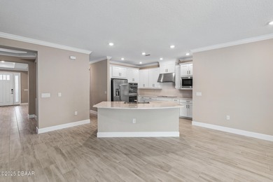 BEAUTIFUL highly-upgraded home in Windchase neighborhood of on Halifax Plantation Golf Club in Florida - for sale on GolfHomes.com, golf home, golf lot