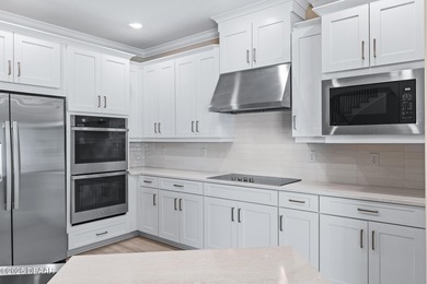 BEAUTIFUL highly-upgraded home in Windchase neighborhood of on Halifax Plantation Golf Club in Florida - for sale on GolfHomes.com, golf home, golf lot