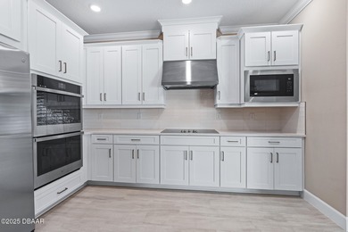 BEAUTIFUL highly-upgraded home in Windchase neighborhood of on Halifax Plantation Golf Club in Florida - for sale on GolfHomes.com, golf home, golf lot