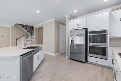 BEAUTIFUL highly-upgraded home in Windchase neighborhood of on Halifax Plantation Golf Club in Florida - for sale on GolfHomes.com, golf home, golf lot