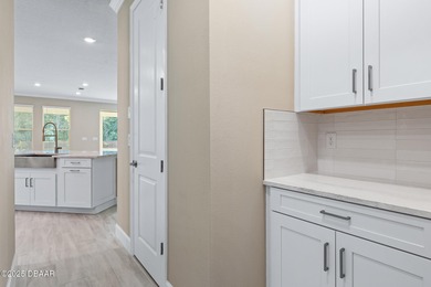 BEAUTIFUL highly-upgraded home in Windchase neighborhood of on Halifax Plantation Golf Club in Florida - for sale on GolfHomes.com, golf home, golf lot