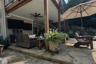 Resort-Style Living in a the exclusive Woodmont Golf and Country on Woodmont Golf and Country Club in Georgia - for sale on GolfHomes.com, golf home, golf lot