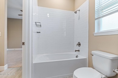 BEAUTIFUL highly-upgraded home in Windchase neighborhood of on Halifax Plantation Golf Club in Florida - for sale on GolfHomes.com, golf home, golf lot