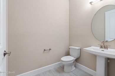 BEAUTIFUL highly-upgraded home in Windchase neighborhood of on Halifax Plantation Golf Club in Florida - for sale on GolfHomes.com, golf home, golf lot