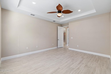 BEAUTIFUL highly-upgraded home in Windchase neighborhood of on Halifax Plantation Golf Club in Florida - for sale on GolfHomes.com, golf home, golf lot