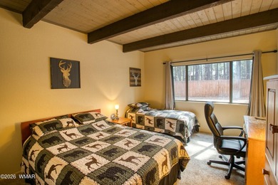 Surrounded by tall pines, this fully-furnished lower-level condo on Pinetop Lakes Golf and Country Club in Arizona - for sale on GolfHomes.com, golf home, golf lot