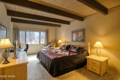 Surrounded by tall pines, this fully-furnished lower-level condo on Pinetop Lakes Golf and Country Club in Arizona - for sale on GolfHomes.com, golf home, golf lot