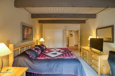 Surrounded by tall pines, this fully-furnished lower-level condo on Pinetop Lakes Golf and Country Club in Arizona - for sale on GolfHomes.com, golf home, golf lot