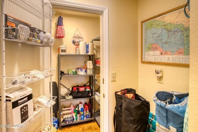 Surrounded by tall pines, this fully-furnished lower-level condo on Pinetop Lakes Golf and Country Club in Arizona - for sale on GolfHomes.com, golf home, golf lot