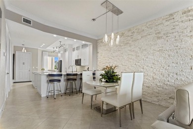 Move right into this elegantly remodeled residence. High quality on  in Florida - for sale on GolfHomes.com, golf home, golf lot