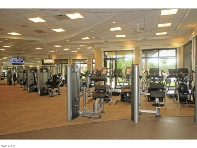 Updates and CUSTOM UPGRADES abound in this BRIGHT, AIRY and OPEN on TPC At Treviso Bay in Florida - for sale on GolfHomes.com, golf home, golf lot