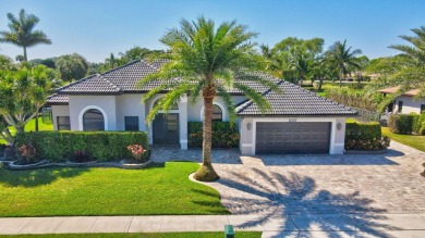 Nestled in the heart of Boca Woods Country Club, this home sits on Boca Woods Country Club in Florida - for sale on GolfHomes.com, golf home, golf lot