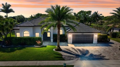 Nestled in the heart of Boca Woods Country Club, this home sits on Boca Woods Country Club in Florida - for sale on GolfHomes.com, golf home, golf lot