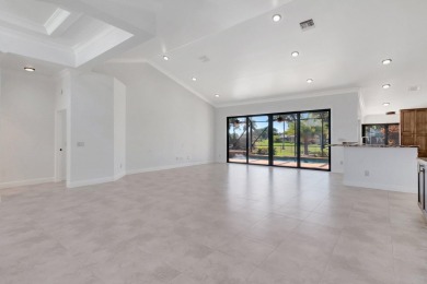 Nestled in the heart of Boca Woods Country Club, this home sits on Boca Woods Country Club in Florida - for sale on GolfHomes.com, golf home, golf lot