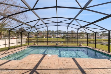 Relax in this quiet 4 bedroom pool home, with low-maintenance on Crane Lakes Golf and Country Club in Florida - for sale on GolfHomes.com, golf home, golf lot