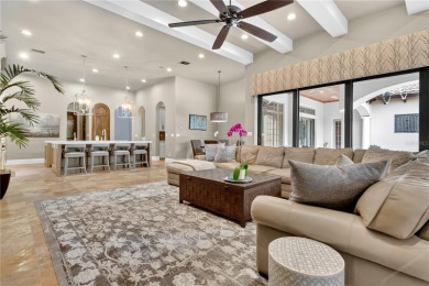Experience the art of fine living in this exquisite one-story on Isleworth Golf and Country Club in Florida - for sale on GolfHomes.com, golf home, golf lot