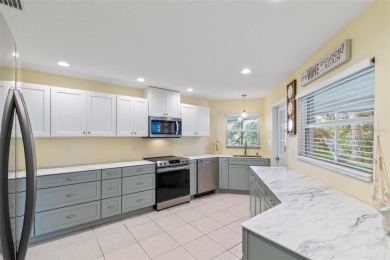 SALT-WATER CANAL - KEY WEST STYLE 'POOL' HOME - JUST 3 BLOCKS TO on Ocean Palm Golf Course in Florida - for sale on GolfHomes.com, golf home, golf lot