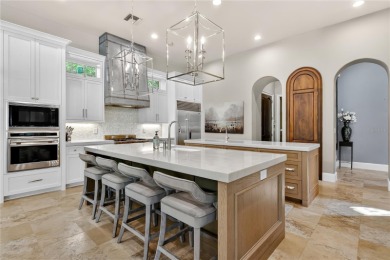 Experience the art of fine living in this exquisite one-story on Isleworth Golf and Country Club in Florida - for sale on GolfHomes.com, golf home, golf lot