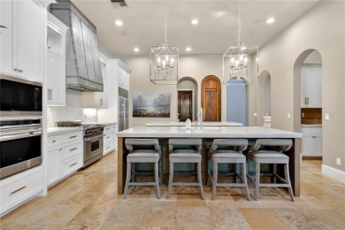 Experience the art of fine living in this exquisite one-story on Isleworth Golf and Country Club in Florida - for sale on GolfHomes.com, golf home, golf lot