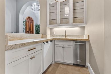 Experience the art of fine living in this exquisite one-story on Isleworth Golf and Country Club in Florida - for sale on GolfHomes.com, golf home, golf lot