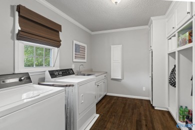 Experience the best of country living with city conveniences in on Brookside Golf Course in Alabama - for sale on GolfHomes.com, golf home, golf lot