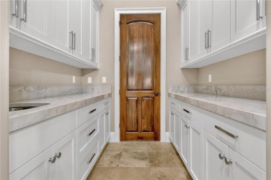 Experience the art of fine living in this exquisite one-story on Isleworth Golf and Country Club in Florida - for sale on GolfHomes.com, golf home, golf lot