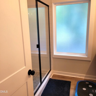 Waterfront home in beautiful Lake Royale with private dock on River Golf and Country Club at Lake Royale in North Carolina - for sale on GolfHomes.com, golf home, golf lot