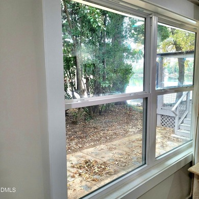 Waterfront home in beautiful Lake Royale with private dock on River Golf and Country Club at Lake Royale in North Carolina - for sale on GolfHomes.com, golf home, golf lot