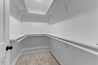 Waterfront home in beautiful Lake Royale with private dock on River Golf and Country Club at Lake Royale in North Carolina - for sale on GolfHomes.com, golf home, golf lot