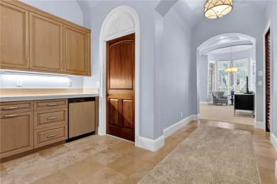Experience the art of fine living in this exquisite one-story on Isleworth Golf and Country Club in Florida - for sale on GolfHomes.com, golf home, golf lot