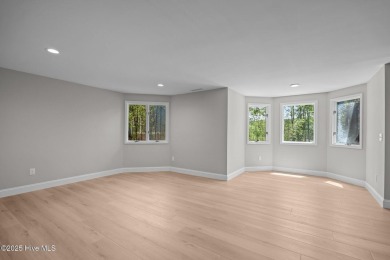 Coastal living at its finest with this exceptionally renovated on Olde Point Golf and Country Club in North Carolina - for sale on GolfHomes.com, golf home, golf lot