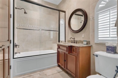 Experience the art of fine living in this exquisite one-story on Isleworth Golf and Country Club in Florida - for sale on GolfHomes.com, golf home, golf lot