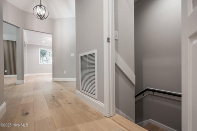 Coastal living at its finest with this exceptionally renovated on Olde Point Golf and Country Club in North Carolina - for sale on GolfHomes.com, golf home, golf lot