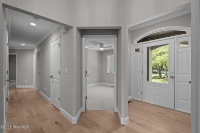 Coastal living at its finest with this exceptionally renovated on Olde Point Golf and Country Club in North Carolina - for sale on GolfHomes.com, golf home, golf lot