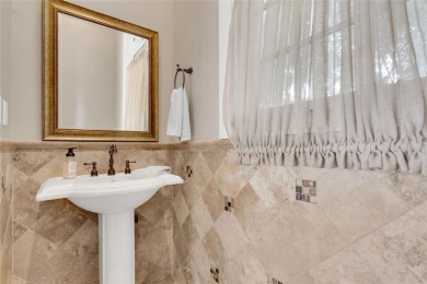 Experience the art of fine living in this exquisite one-story on Isleworth Golf and Country Club in Florida - for sale on GolfHomes.com, golf home, golf lot