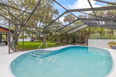 SALT-WATER CANAL - KEY WEST STYLE 'POOL' HOME - JUST 3 BLOCKS TO on Ocean Palm Golf Course in Florida - for sale on GolfHomes.com, golf home, golf lot