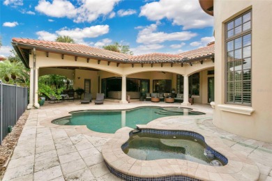 Experience the art of fine living in this exquisite one-story on Isleworth Golf and Country Club in Florida - for sale on GolfHomes.com, golf home, golf lot