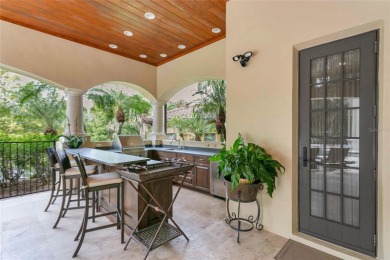 Experience the art of fine living in this exquisite one-story on Isleworth Golf and Country Club in Florida - for sale on GolfHomes.com, golf home, golf lot