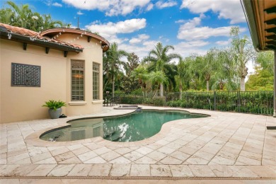 Experience the art of fine living in this exquisite one-story on Isleworth Golf and Country Club in Florida - for sale on GolfHomes.com, golf home, golf lot